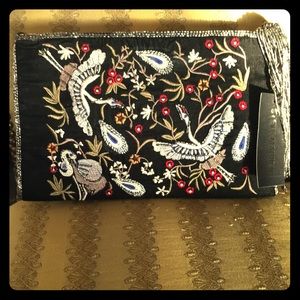 Black velvet embroidered clutch with tassel